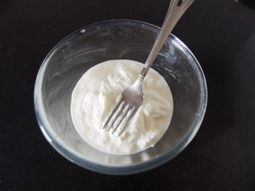 Take 150 grams of curd in a bowl.