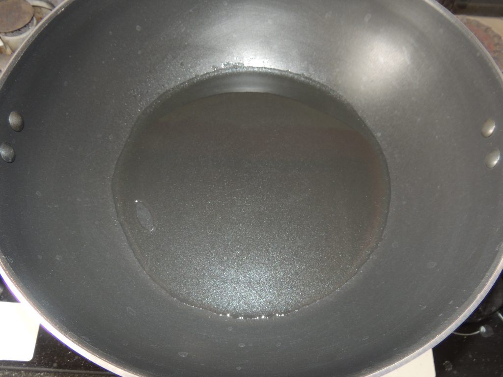 First take one fry pan or kadai, and place kadai on the gas.