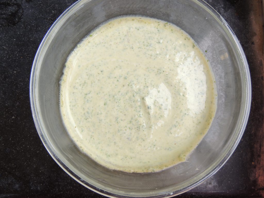 Mix the paste and curd.