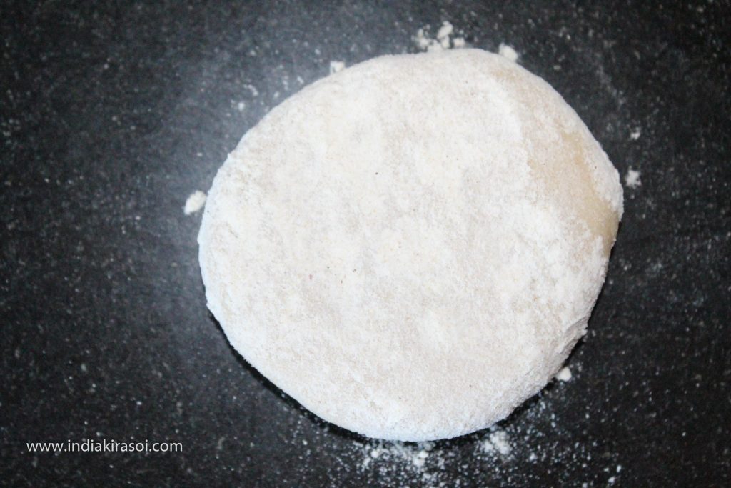 Now apply the flour dust in the dough ball.