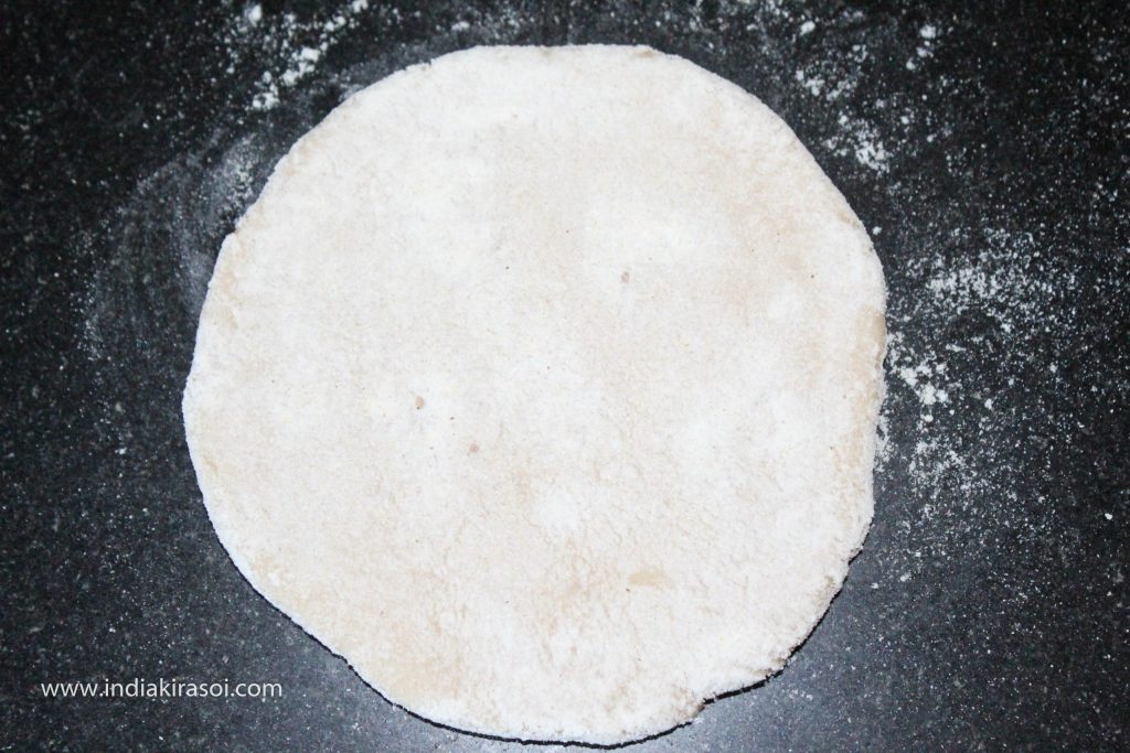 Take care to roll the paratha lightly with hand by rolling pin so that the stuffings do not come out.