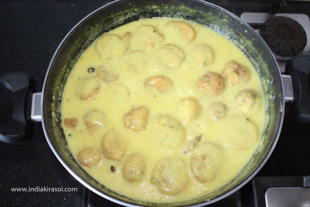 Kadhi would be on other gas on low flame. Wait for 10 minutes, continue to simmer the kadhi on the gas. After that switch off the gas.