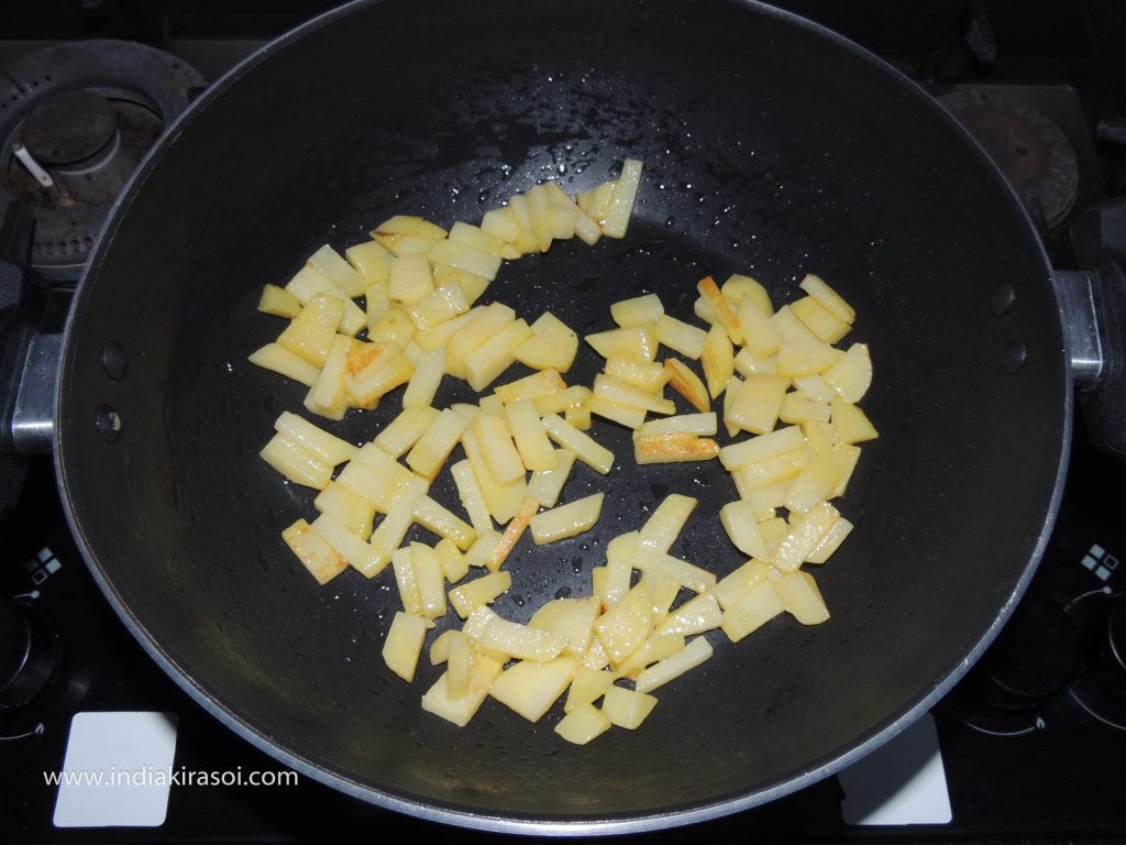 Fry the potatoes for 3 to 4 minutes, fry the potatoes till they turn light brown.
