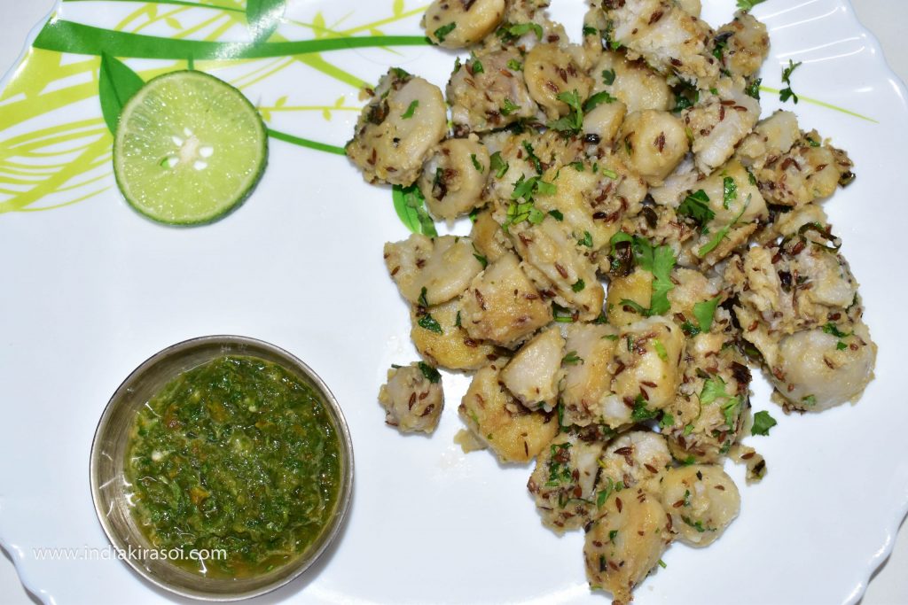 Take out the fried colocasia /ghuiyaan or arbi in a plate.
