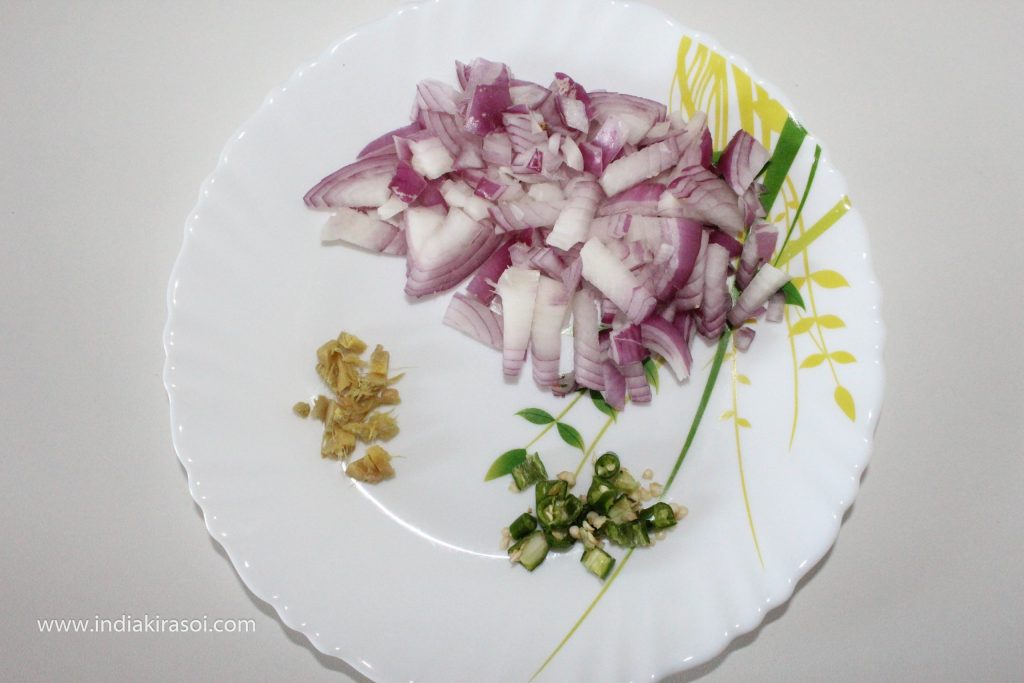Take a medium sized onion, finely chop the onion.