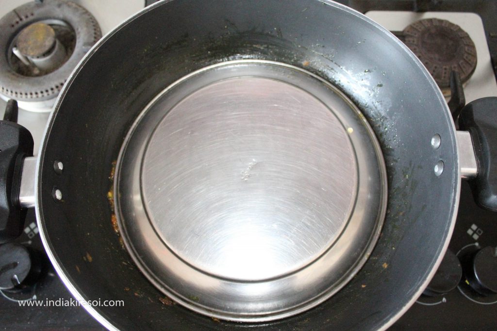 Cover the kadhai/ fry pan with a plate.Remove the plate after 3 to 4 minutes.