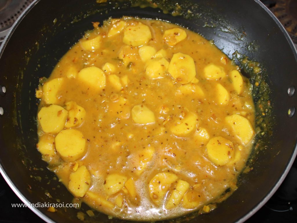 Mix raw mango/ khatai powder and chat masala powder well. Turn down the flame.