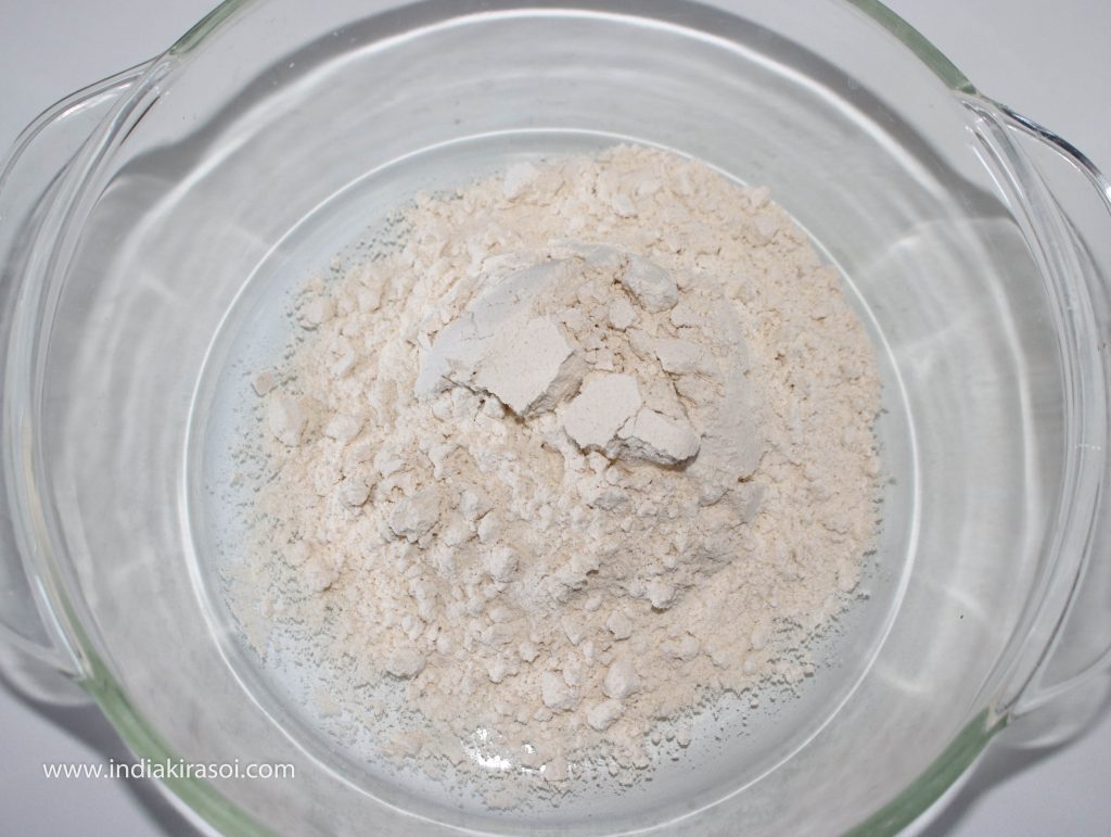 Take 100 grams or one cup of flour in a vessel.