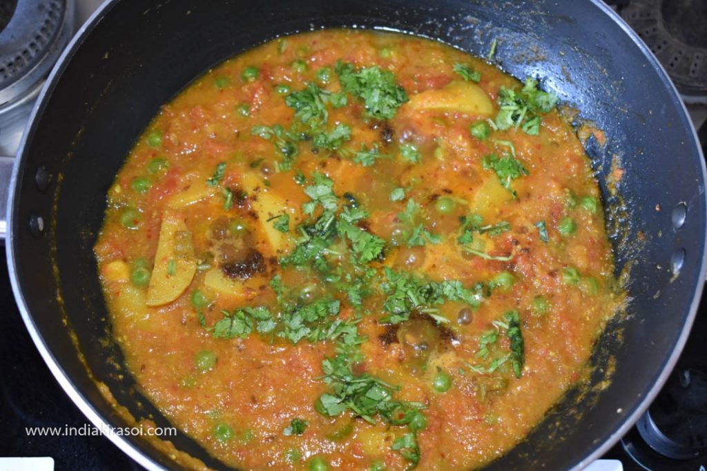 Add chopped coriander in the kadhai/ fry pan.
