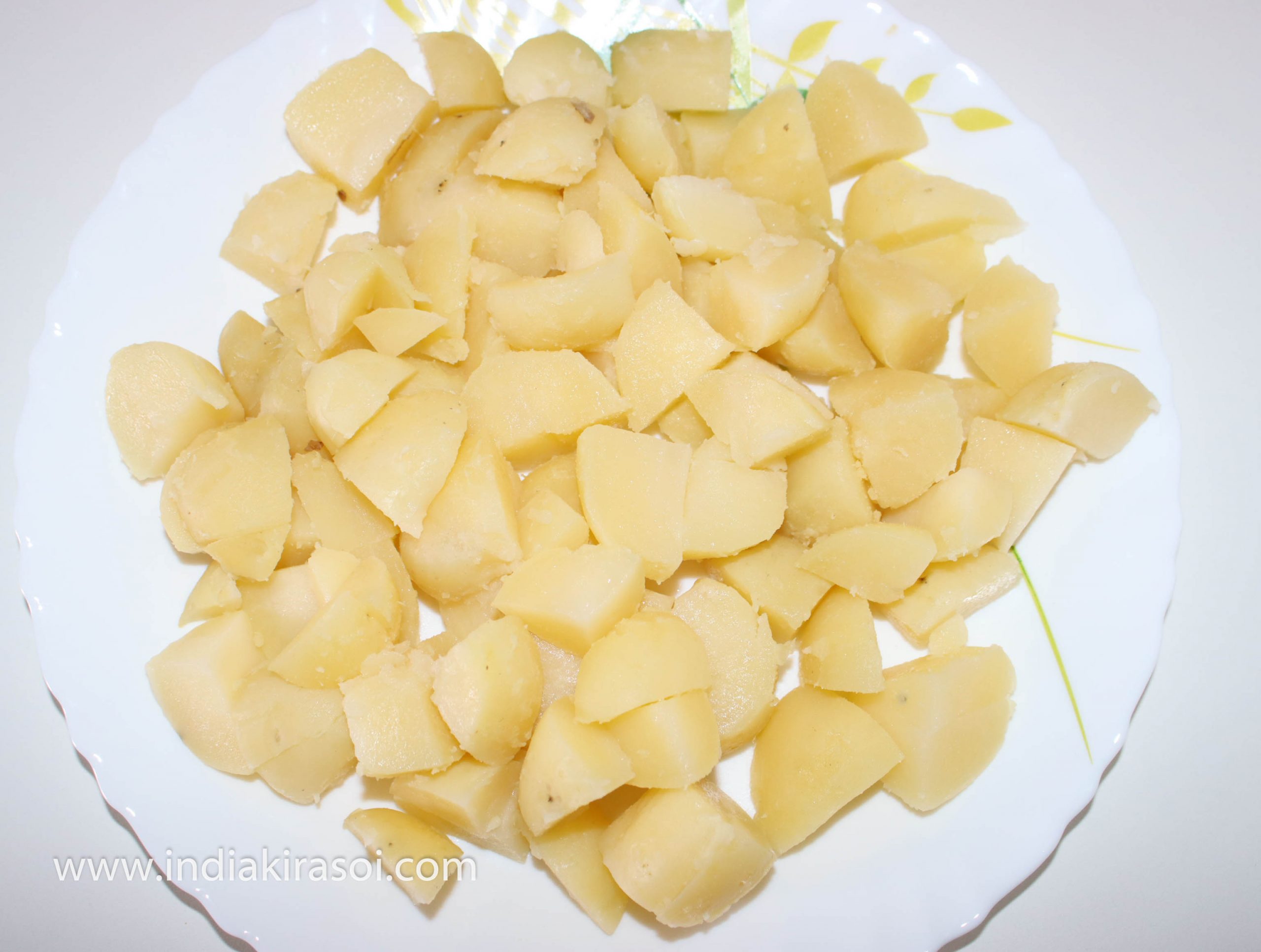 peel the potatoes and cut potatoes in small pieces.