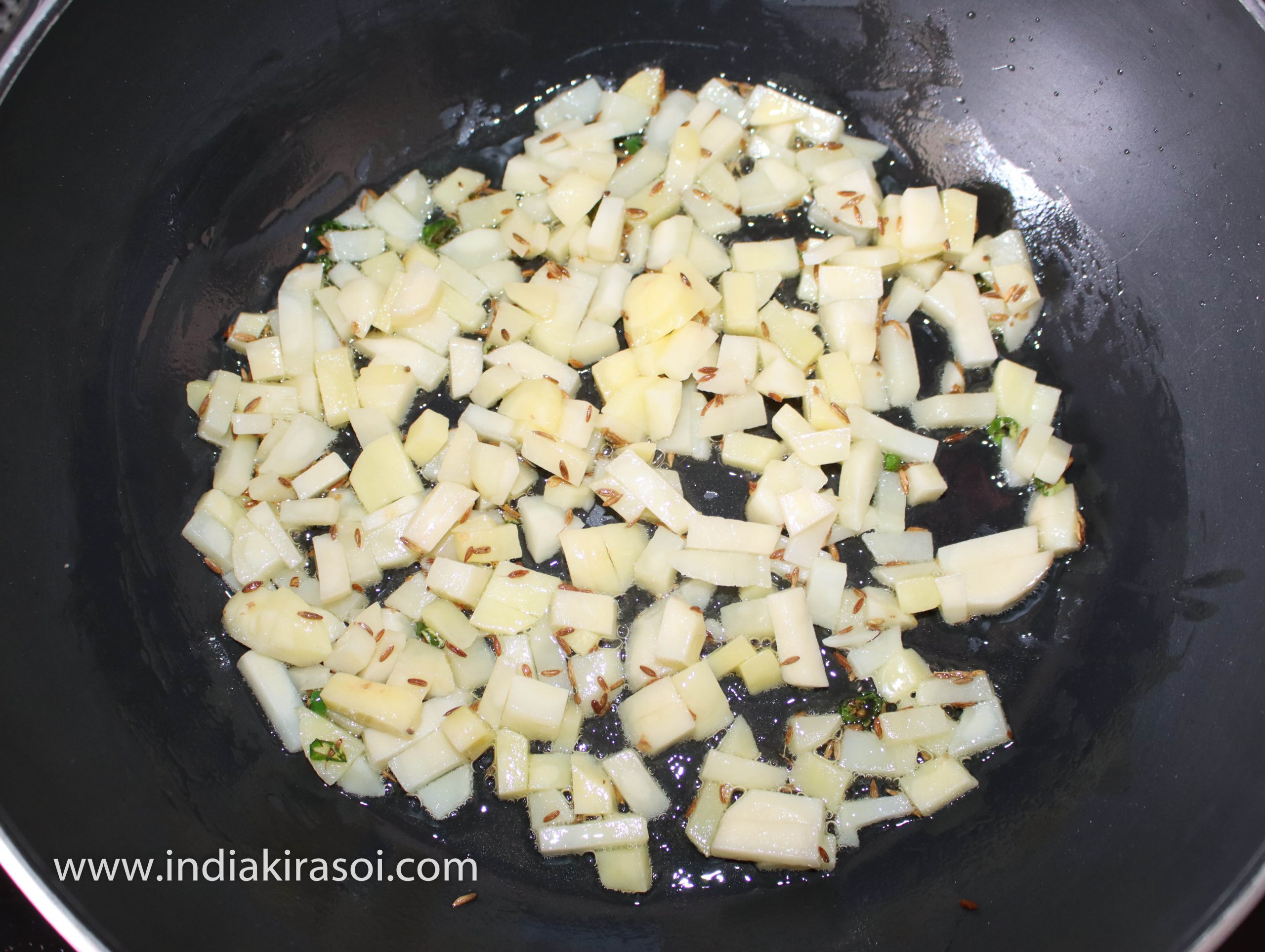 Mix chopped potatoes.